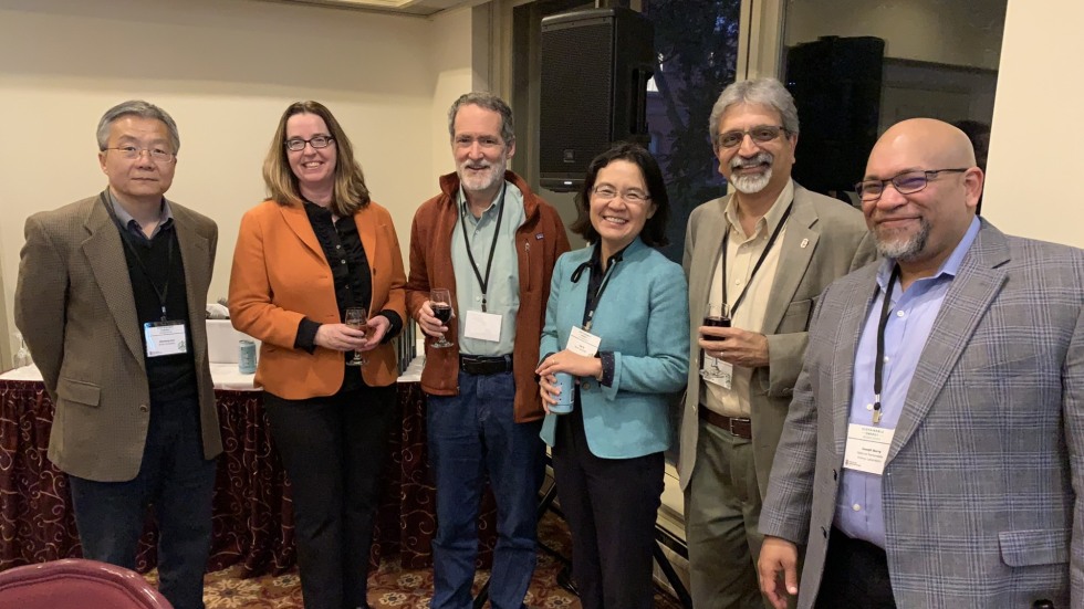 Group photo at workshop dinner, Oct 25